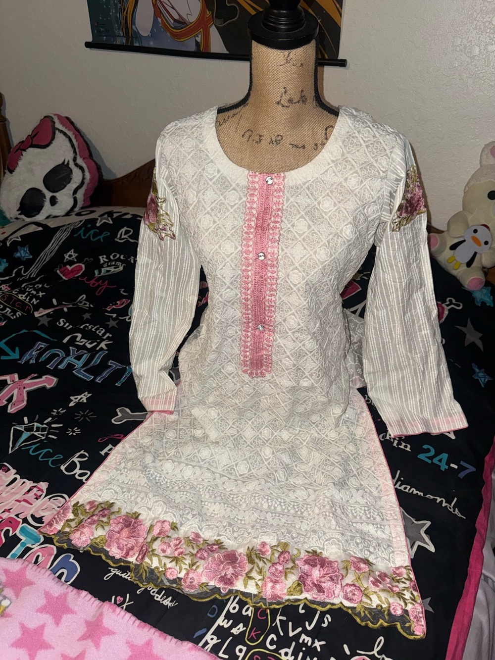 White & pink floral embroidered dress with lace detailing and pink trim